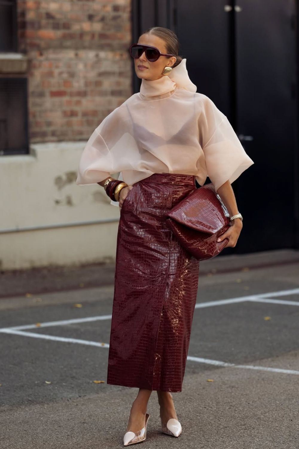 Long leather skirts are chic, versatile, and timeless. From casual street style with sneakers to bold color-block looks, discover 30+ stylish long leather skirt outfit ideas to inspire your wardrobe for work, weekends, and nights out. Perfect outfit inspiration for every season. Long Black Leather Skirt Outfit, Winter, Black, Midi Leather Skirt, Long Brown Leather Skirt Outfit, Long Faux Leather Skirt, How To Style A Long Leather Skirt, Outfits With Long Leather Skirt, Leather Midi Skirt Outfit