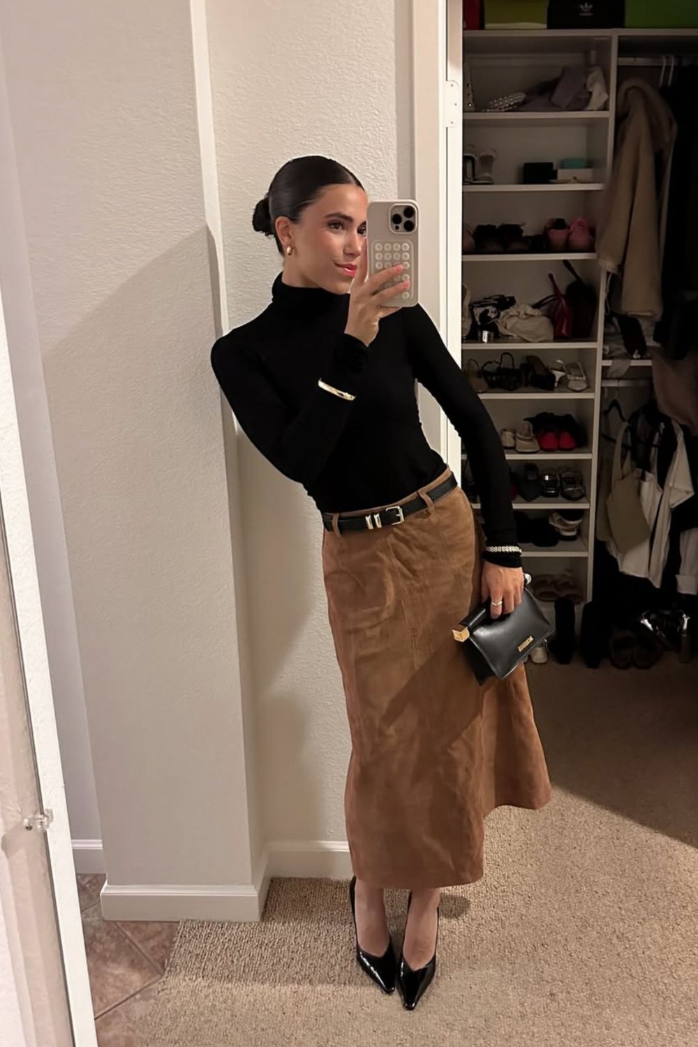Long leather skirts are chic, versatile, and timeless. From casual street style with sneakers to bold color-block looks, discover 30+ stylish long leather skirt outfit ideas to inspire your wardrobe for work, weekends, and nights out. Perfect outfit inspiration for every season. Long Black Leather Skirt Outfit, Winter, Black, Midi Leather Skirt, Long Brown Leather Skirt Outfit, Long Faux Leather Skirt, How To Style A Long Leather Skirt, Outfits With Long Leather Skirt, Leather Midi Skirt Outfit