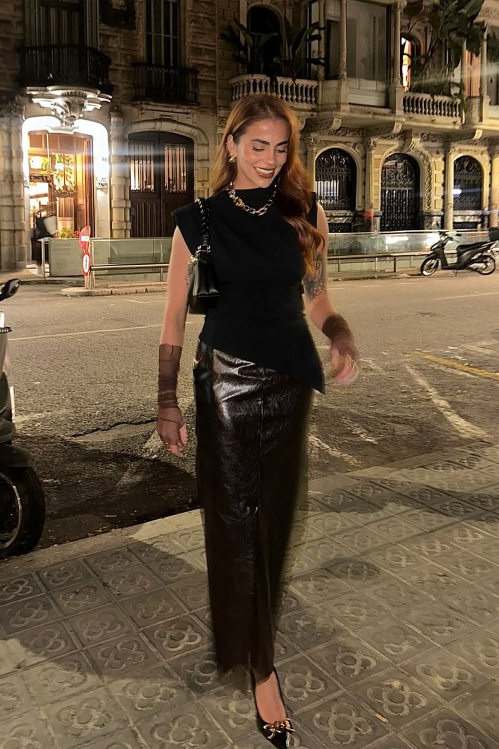 Long leather skirts are chic, versatile, and timeless. From casual street style with sneakers to bold color-block looks, discover 30+ stylish long leather skirt outfit ideas to inspire your wardrobe for work, weekends, and nights out. Perfect outfit inspiration for every season. Long Black Leather Skirt Outfit, Winter, Black, Midi Leather Skirt, Long Brown Leather Skirt Outfit, Long Faux Leather Skirt, How To Style A Long Leather Skirt, Outfits With Long Leather Skirt, Leather Midi Skirt Outfit