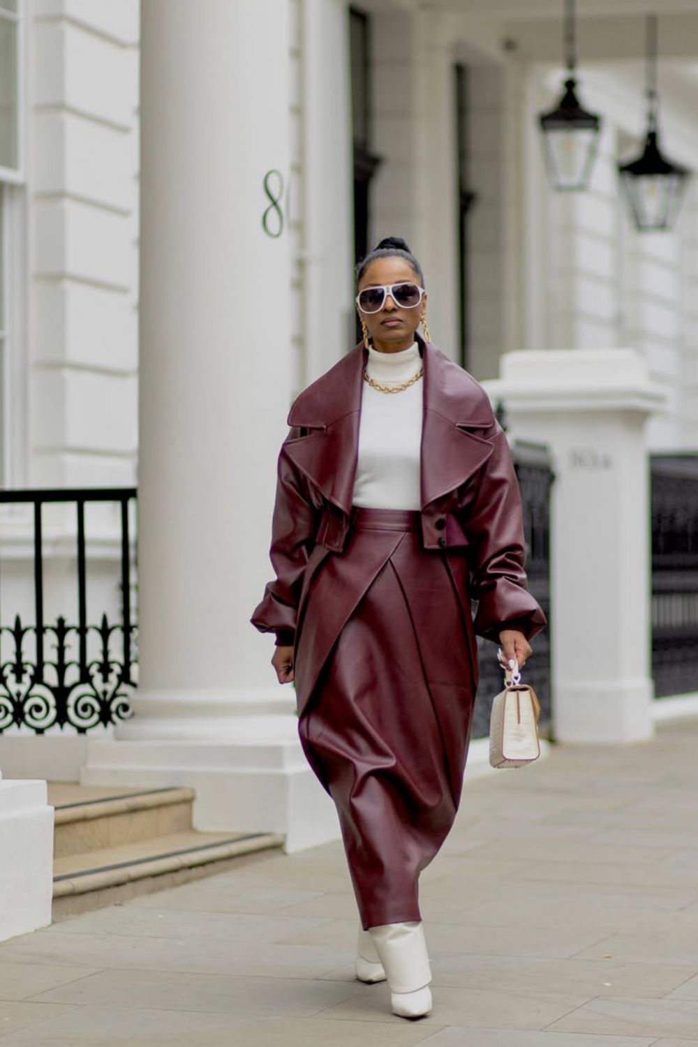 Long leather skirts are chic, versatile, and timeless. From casual street style with sneakers to bold color-block looks, discover 30+ stylish long leather skirt outfit ideas to inspire your wardrobe for work, weekends, and nights out. Perfect outfit inspiration for every season. Long Black Leather Skirt Outfit, Winter, Black, Midi Leather Skirt, Long Brown Leather Skirt Outfit, Long Faux Leather Skirt, How To Style A Long Leather Skirt, Outfits With Long Leather Skirt, Leather Midi Skirt Outfit