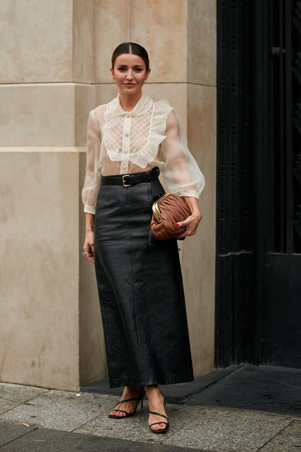 Long leather skirts are chic, versatile, and timeless. From casual street style with sneakers to bold color-block looks, discover 30+ stylish long leather skirt outfit ideas to inspire your wardrobe for work, weekends, and nights out. Perfect outfit inspiration for every season. Long Black Leather Skirt Outfit, Winter, Black, Midi Leather Skirt, Long Brown Leather Skirt Outfit, Long Faux Leather Skirt, How To Style A Long Leather Skirt, Outfits With Long Leather Skirt, Leather Midi Skirt Outfit