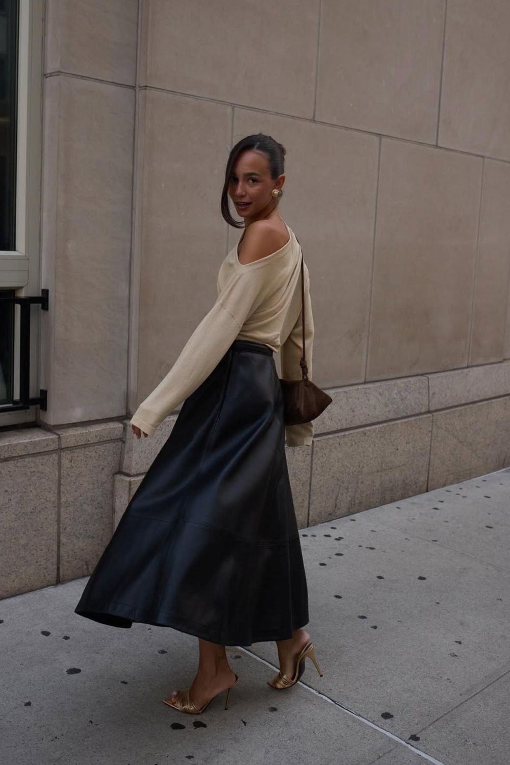 Long leather skirts are chic, versatile, and timeless. From casual street style with sneakers to bold color-block looks, discover 30+ stylish long leather skirt outfit ideas to inspire your wardrobe for work, weekends, and nights out. Perfect outfit inspiration for every season. Long Black Leather Skirt Outfit, Winter, Black, Midi Leather Skirt, Long Brown Leather Skirt Outfit, Long Faux Leather Skirt, How To Style A Long Leather Skirt, Outfits With Long Leather Skirt, Leather Midi Skirt Outfit