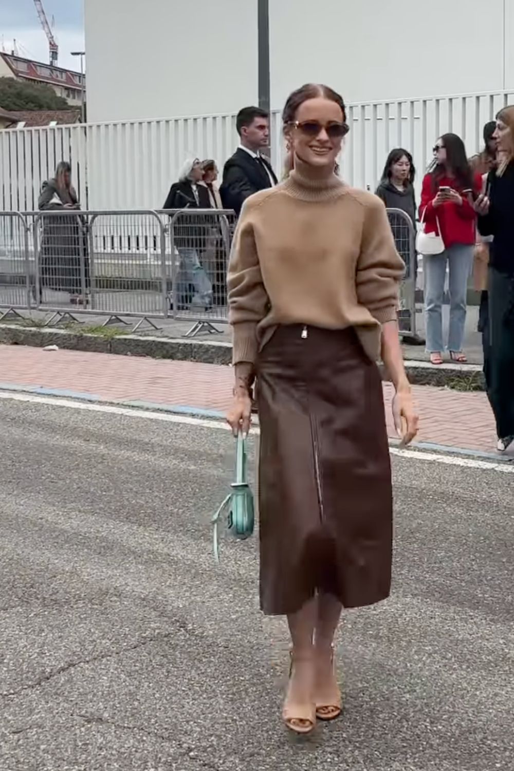 Long leather skirts are chic, versatile, and timeless. From casual street style with sneakers to bold color-block looks, discover 30+ stylish long leather skirt outfit ideas to inspire your wardrobe for work, weekends, and nights out. Perfect outfit inspiration for every season. Long Black Leather Skirt Outfit, Winter, Black, Midi Leather Skirt, Long Brown Leather Skirt Outfit, Long Faux Leather Skirt, How To Style A Long Leather Skirt, Outfits With Long Leather Skirt, Leather Midi Skirt Outfit