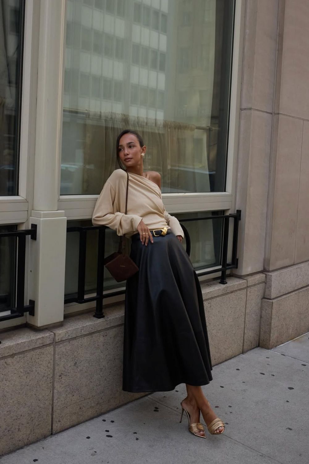 Long leather skirts are chic, versatile, and timeless. From casual street style with sneakers to bold color-block looks, discover 30+ stylish long leather skirt outfit ideas to inspire your wardrobe for work, weekends, and nights out. Perfect outfit inspiration for every season. Long Black Leather Skirt Outfit, Winter, Black, Midi Leather Skirt, Long Brown Leather Skirt Outfit, Long Faux Leather Skirt, How To Style A Long Leather Skirt, Outfits With Long Leather Skirt, Leather Midi Skirt Outfit