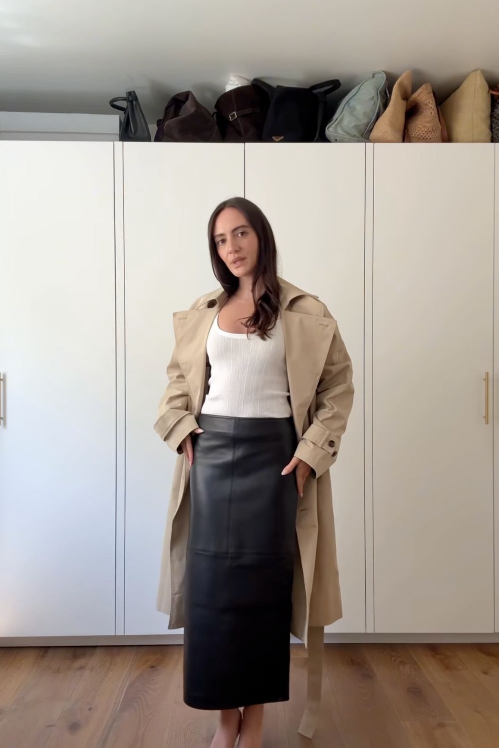 Long leather skirts are chic, versatile, and timeless. From casual street style with sneakers to bold color-block looks, discover 30+ stylish long leather skirt outfit ideas to inspire your wardrobe for work, weekends, and nights out. Perfect outfit inspiration for every season. Long Black Leather Skirt Outfit, Winter, Black, Midi Leather Skirt, Long Brown Leather Skirt Outfit, Long Faux Leather Skirt, How To Style A Long Leather Skirt, Outfits With Long Leather Skirt, Leather Midi Skirt Outfit