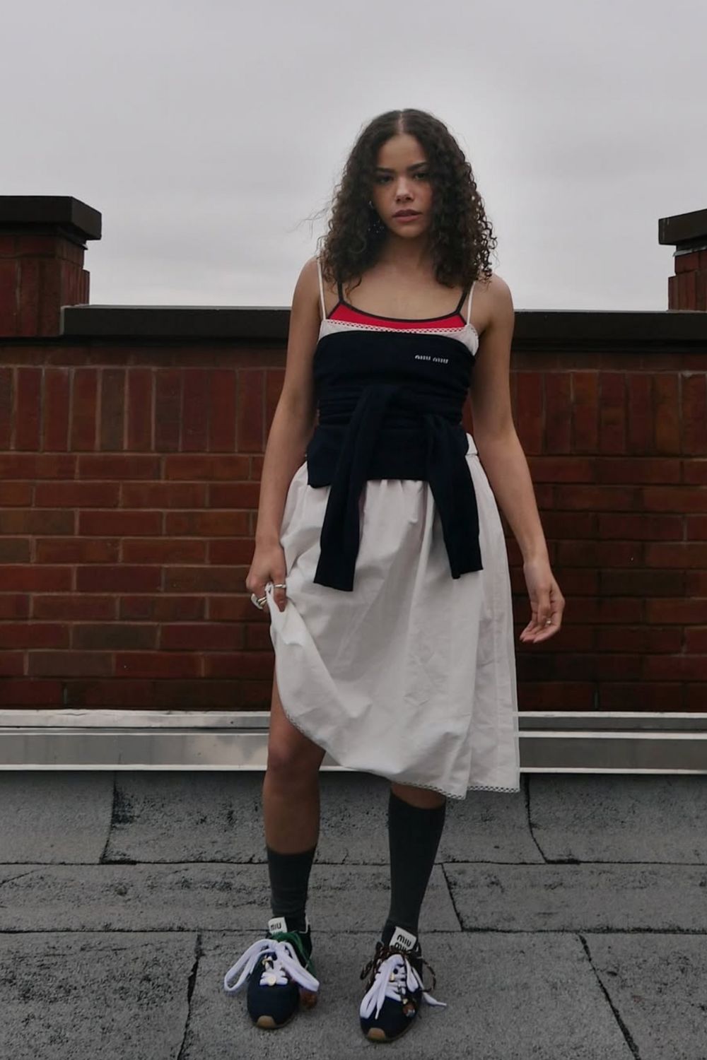 Discover 20 chic Miu Miu sneakers outfit ideas that blend sporty elegance with high-fashion style. From denim-on-denim looks to feminine dresses and tailored layers, these outfits show how to style Miu Miu sneakers for any occasion in effortlessly polished ways.