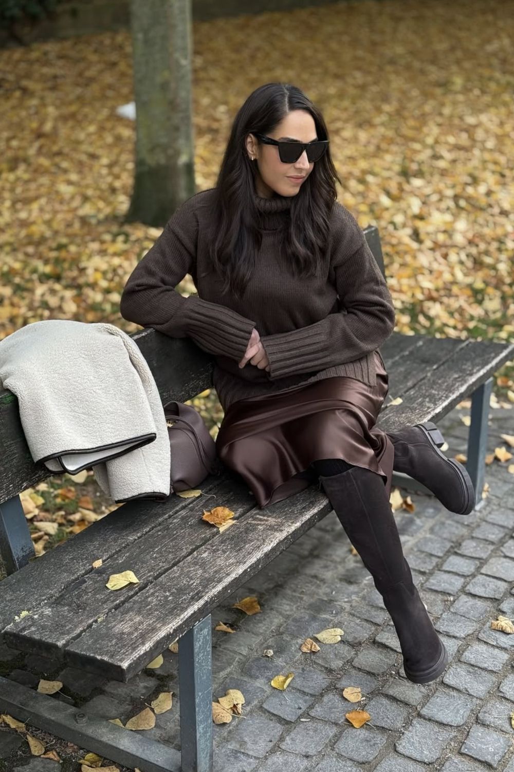 Discover chic brown satin skirt outfit ideas — from cozy knits and tailored blazers to sporty sneakers and elegant heels. Perfect for fall or winter, these looks show how to style a satin skirt for casual days or polished evenings. Discover chic brown satin skirt outfit ideas — from cozy knits and tailored blazers to sporty sneakers and elegant heels. Perfect for fall or winter, these looks show how to style a satin skirt for casual days or polished evenings.Satin Brown Skirt Outfit, Brown Satin Skirt Outfit Summer, Brown Satin Midi Skirt Outfit, Brown Satin Skirt Outfit Winter, Brown Satin Maxi Skirt Outfit