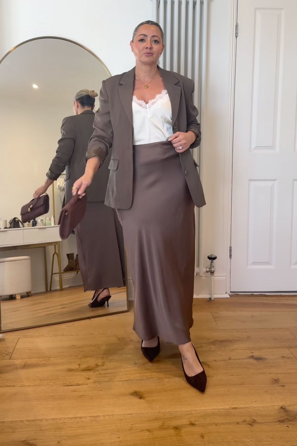 Discover chic brown satin skirt outfit ideas — from cozy knits and tailored blazers to sporty sneakers and elegant heels. Perfect for fall or winter, these looks show how to style a satin skirt for casual days or polished evenings. Discover chic brown satin skirt outfit ideas — from cozy knits and tailored blazers to sporty sneakers and elegant heels. Perfect for fall or winter, these looks show how to style a satin skirt for casual days or polished evenings.Satin Brown Skirt Outfit, Brown Satin Skirt Outfit Summer, Brown Satin Midi Skirt Outfit, Brown Satin Skirt Outfit Winter, Brown Satin Maxi Skirt Outfit