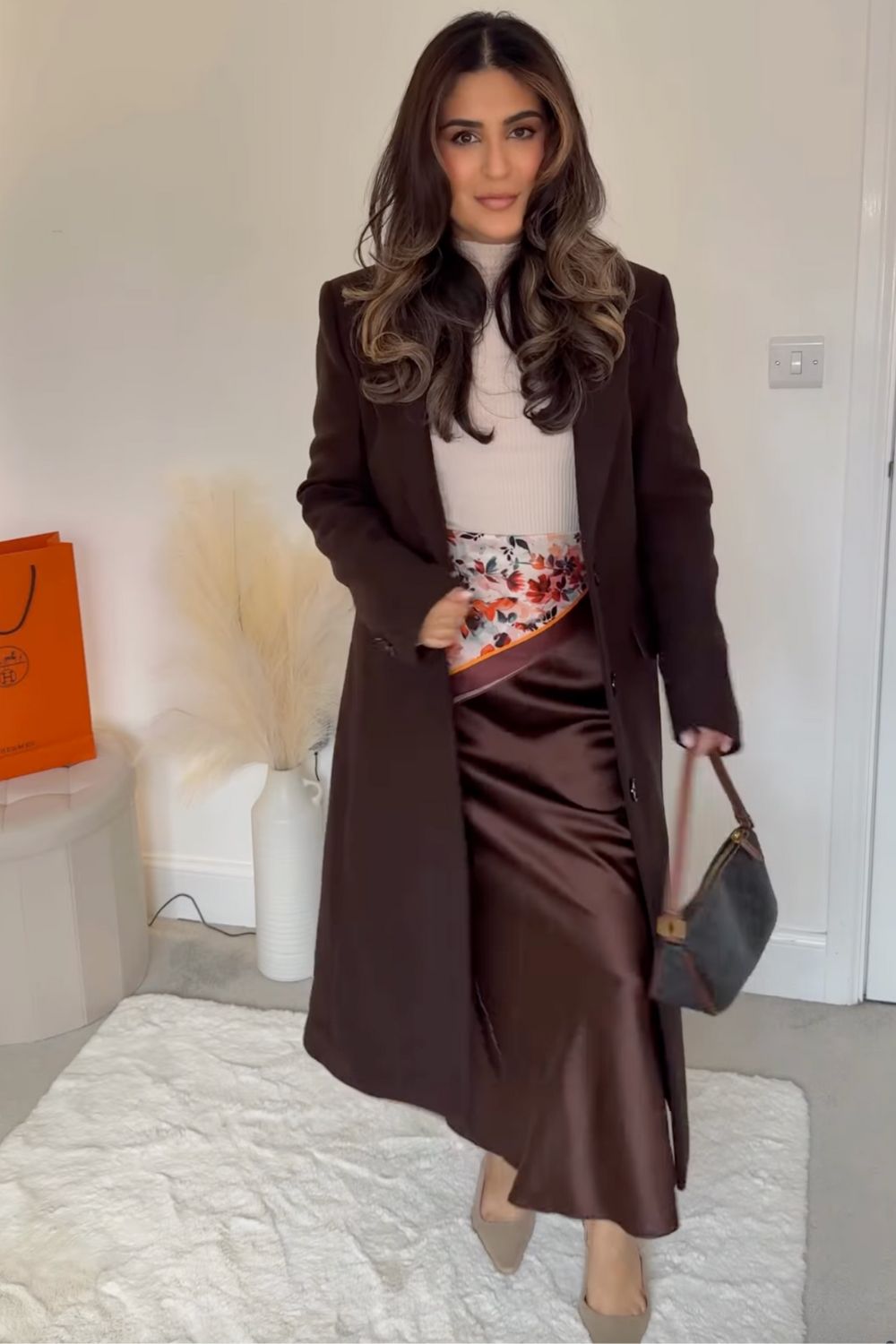 Discover chic brown satin skirt outfit ideas — from cozy knits and tailored blazers to sporty sneakers and elegant heels. Perfect for fall or winter, these looks show how to style a satin skirt for casual days or polished evenings. Discover chic brown satin skirt outfit ideas — from cozy knits and tailored blazers to sporty sneakers and elegant heels. Perfect for fall or winter, these looks show how to style a satin skirt for casual days or polished evenings.Satin Brown Skirt Outfit, Brown Satin Skirt Outfit Summer, Brown Satin Midi Skirt Outfit, Brown Satin Skirt Outfit Winter, Brown Satin Maxi Skirt Outfit