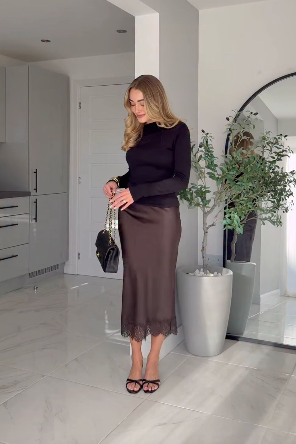 Discover chic brown satin skirt outfit ideas — from cozy knits and tailored blazers to sporty sneakers and elegant heels. Perfect for fall or winter, these looks show how to style a satin skirt for casual days or polished evenings. Discover chic brown satin skirt outfit ideas — from cozy knits and tailored blazers to sporty sneakers and elegant heels. Perfect for fall or winter, these looks show how to style a satin skirt for casual days or polished evenings.Satin Brown Skirt Outfit, Brown Satin Skirt Outfit Summer, Brown Satin Midi Skirt Outfit, Brown Satin Skirt Outfit Winter, Brown Satin Maxi Skirt Outfit