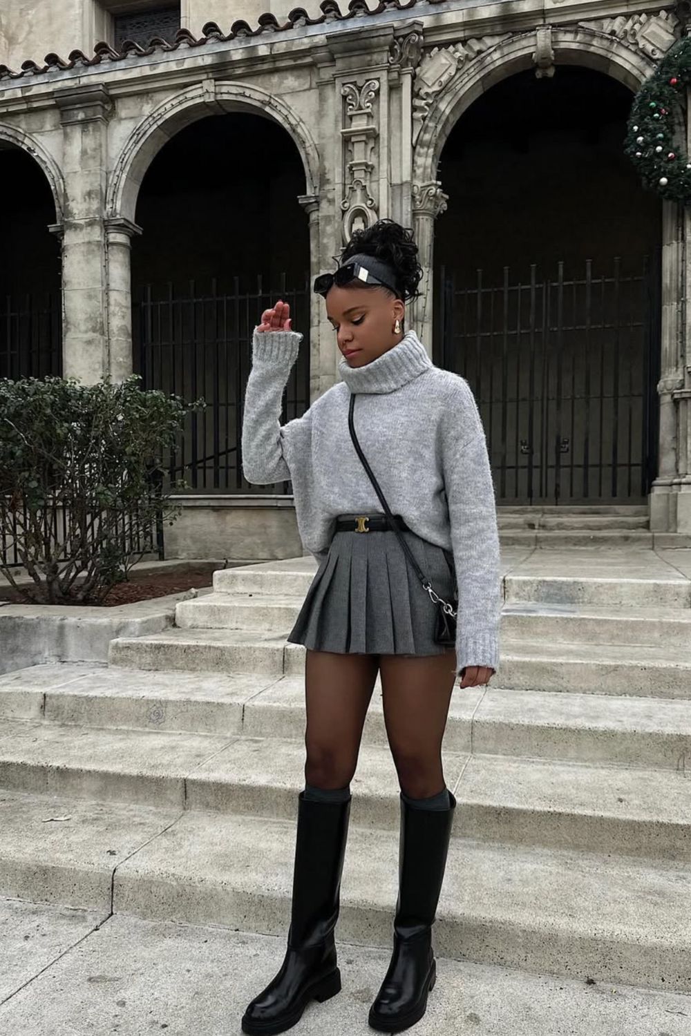 Discover 30+ chic grey mini skirt outfit ideas, from preppy layered looks to cozy knits and street-style classics. Get styling tips, seasonal inspiration, and trendy ways to wear a grey mini skirt all year round. Grey Mini Skirt Outfit Winter, Mini Grey Skirt Outfit, Grey Pleated Mini Skirt Outfit, Grey Mini Skirt Outfit Summer, Grey Mini Skirt Outfit Black Women, Grey Mini Skirt Outfit Aesthetic, Grey Pleated Skirt Outfit, Grey Satin Skirt Outfit, Grey Midi Skirt Outfit, Grey Midi Skirt Outfit