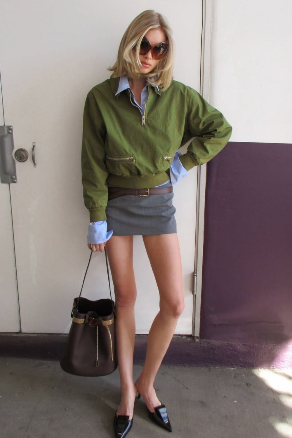 Discover 30+ chic grey mini skirt outfit ideas, from preppy layered looks to cozy knits and street-style classics. Get styling tips, seasonal inspiration, and trendy ways to wear a grey mini skirt all year round. Grey Mini Skirt Outfit Winter, Mini Grey Skirt Outfit, Grey Pleated Mini Skirt Outfit, Grey Mini Skirt Outfit Summer, Grey Mini Skirt Outfit Black Women, Grey Mini Skirt Outfit Aesthetic, Grey Pleated Skirt Outfit, Grey Satin Skirt Outfit, Grey Midi Skirt Outfit, Grey Midi Skirt Outfit