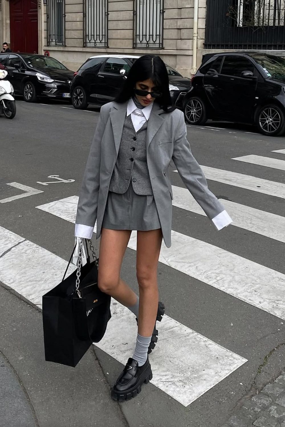 Discover 30+ chic grey mini skirt outfit ideas, from preppy layered looks to cozy knits and street-style classics. Get styling tips, seasonal inspiration, and trendy ways to wear a grey mini skirt all year round. Grey Mini Skirt Outfit Winter, Mini Grey Skirt Outfit, Grey Pleated Mini Skirt Outfit, Grey Mini Skirt Outfit Summer, Grey Mini Skirt Outfit Black Women, Grey Mini Skirt Outfit Aesthetic, Grey Pleated Skirt Outfit, Grey Satin Skirt Outfit, Grey Midi Skirt Outfit, Grey Midi Skirt Outfit