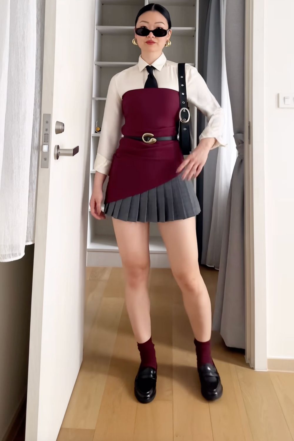 Discover 30+ chic grey mini skirt outfit ideas, from preppy layered looks to cozy knits and street-style classics. Get styling tips, seasonal inspiration, and trendy ways to wear a grey mini skirt all year round. Grey Mini Skirt Outfit Winter, Mini Grey Skirt Outfit, Grey Pleated Mini Skirt Outfit, Grey Mini Skirt Outfit Summer, Grey Mini Skirt Outfit Black Women, Grey Mini Skirt Outfit Aesthetic, Grey Pleated Skirt Outfit, Grey Satin Skirt Outfit, Grey Midi Skirt Outfit, Grey Midi Skirt Outfit