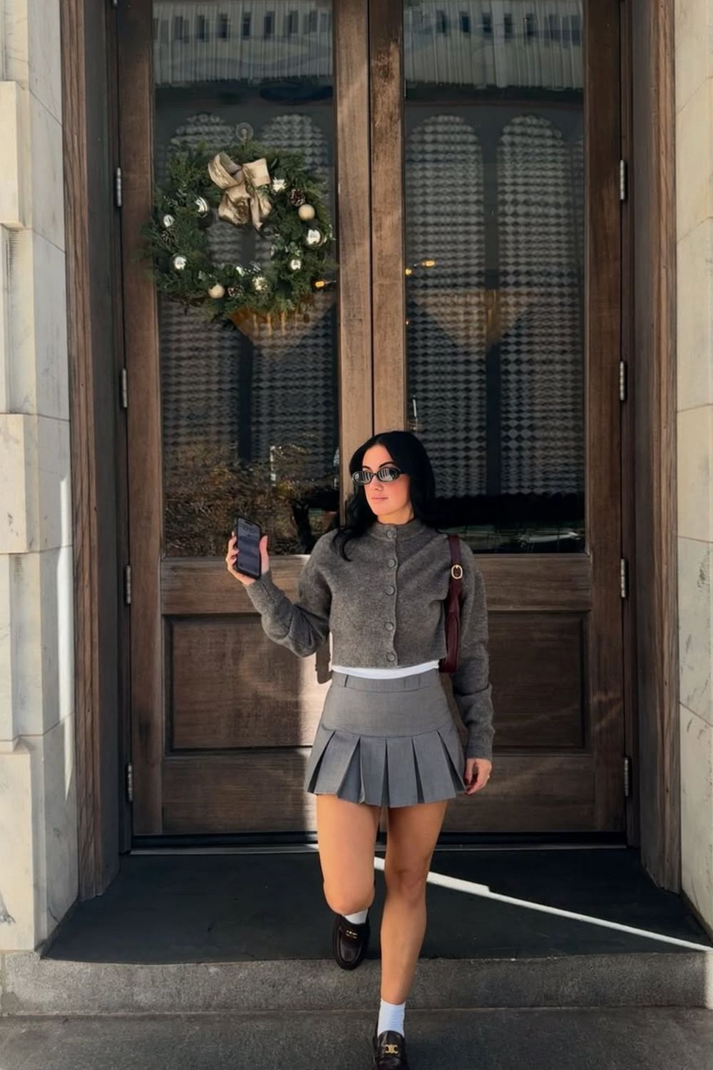 Discover 30+ chic grey mini skirt outfit ideas, from preppy layered looks to cozy knits and street-style classics. Get styling tips, seasonal inspiration, and trendy ways to wear a grey mini skirt all year round. Grey Mini Skirt Outfit Winter, Mini Grey Skirt Outfit, Grey Pleated Mini Skirt Outfit, Grey Mini Skirt Outfit Summer, Grey Mini Skirt Outfit Black Women, Grey Mini Skirt Outfit Aesthetic, Grey Pleated Skirt Outfit, Grey Satin Skirt Outfit, Grey Midi Skirt Outfit, Grey Midi Skirt Outfit