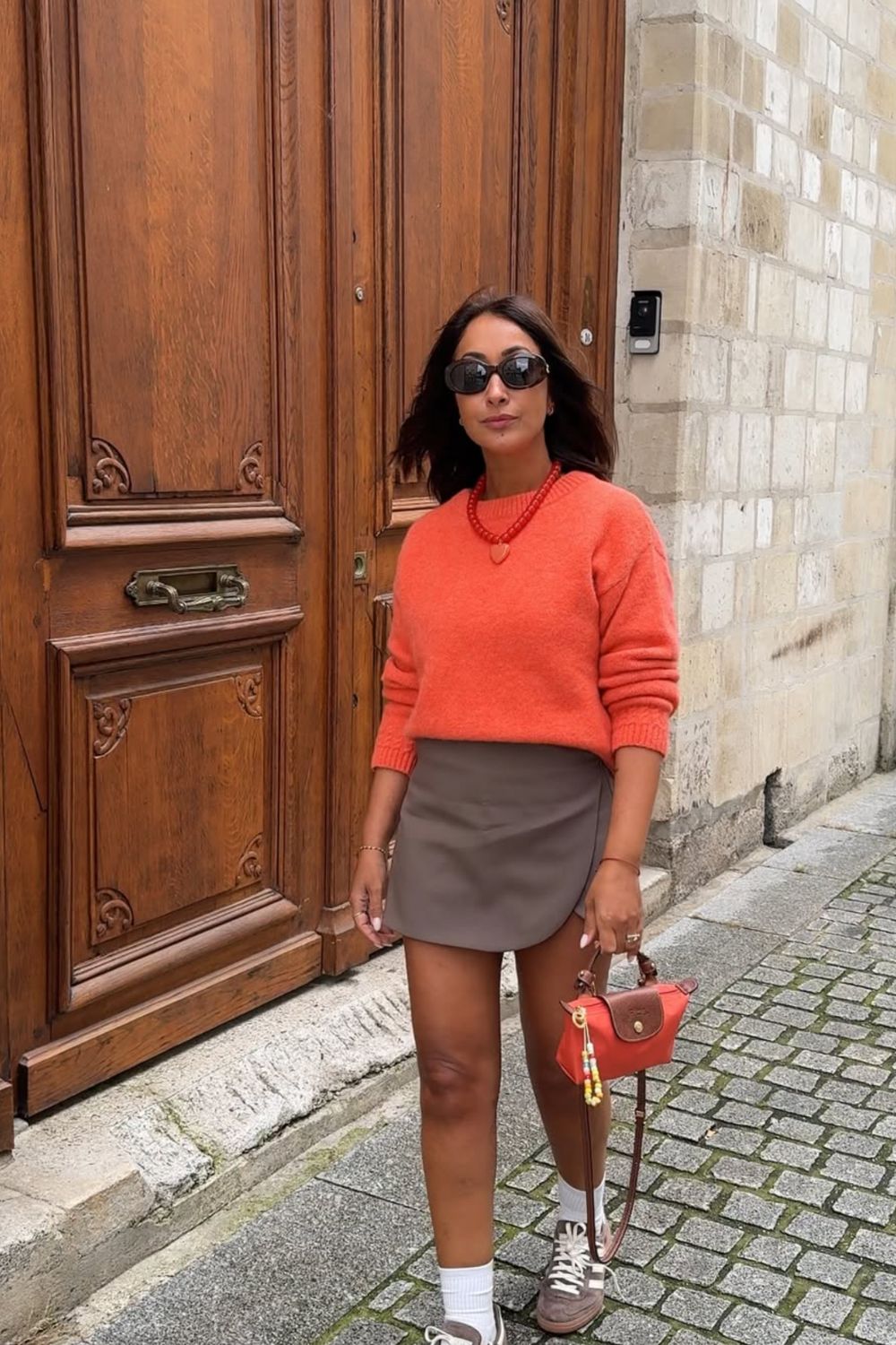 Chic orange sweater outfit ideas featuring bold color combos, layered looks, skirts, trousers, and accessories—plus stylish ways to pair your orange knit with pink shoes. Perfect inspiration for fall, winter, and Pinterest fashion boards. burnt orange sweater outfit, orange knit sweater outfit, orange sweater outfit fall looks, orange sweater outfit winter, orange sweater vest outfit, orange sweater outfit aesthetic, orange sweater dress outfit, bright orange sweater outfit, burnt orange sweater outfit fall, orange knitted sweater outfit, light orange sweater outfit, red orange sweater outfit, rust orange sweater outfit, orange crop sweater outfit, burnt orange knit sweater outfit
