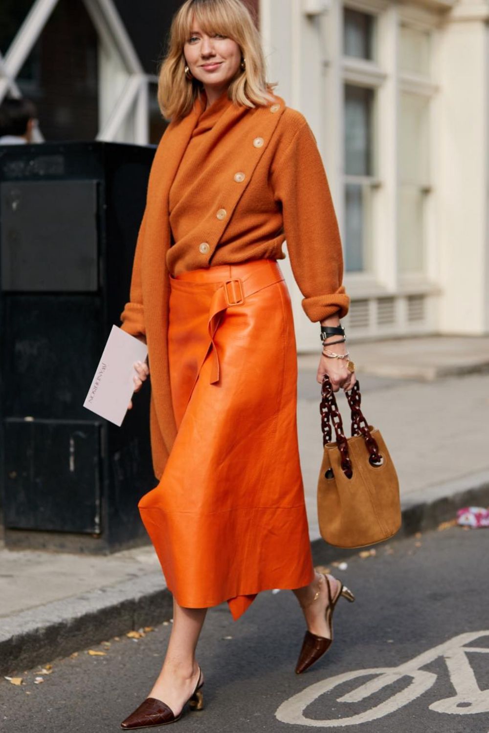 Chic orange sweater outfit ideas featuring bold color combos, layered looks, skirts, trousers, and accessories—plus stylish ways to pair your orange knit with pink shoes. Perfect inspiration for fall, winter, and Pinterest fashion boards. burnt orange sweater outfit, orange knit sweater outfit, orange sweater outfit fall looks, orange sweater outfit winter, orange sweater vest outfit, orange sweater outfit aesthetic, orange sweater dress outfit, bright orange sweater outfit, burnt orange sweater outfit fall, orange knitted sweater outfit, light orange sweater outfit, red orange sweater outfit, rust orange sweater outfit, orange crop sweater outfit, burnt orange knit sweater outfit