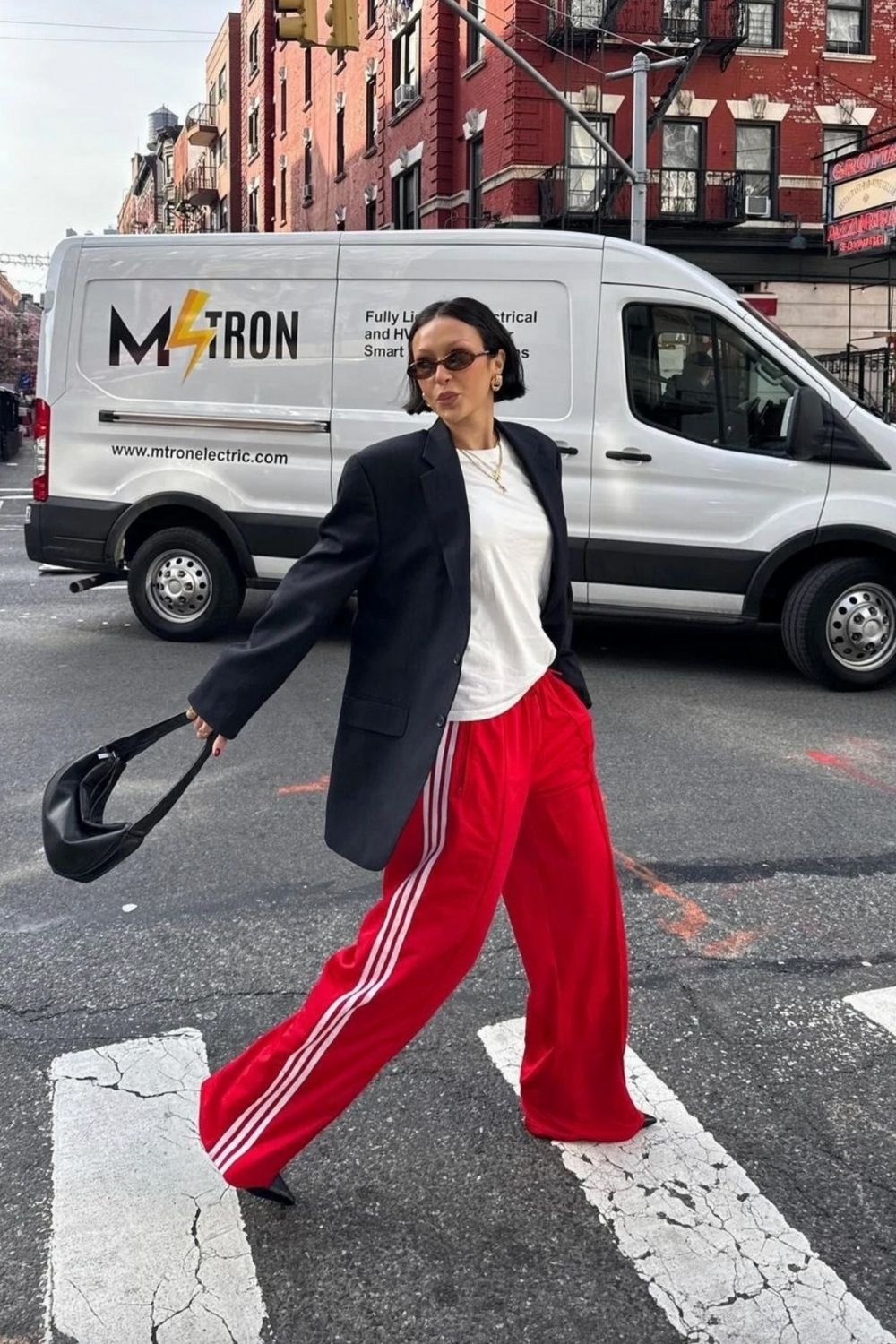 Discover chic Adidas track pants outfit ideas that blend sporty comfort with street-style flair. From cozy layers to elevated casual looks, learn how to style your favorite three-stripe pants for every season and occasion. Adidas Track Pants Outfit Woman, Adidas Track Pants Outfit Aesthetic, Adidas Track Jacket Outfit Street Style, Adidas Track Shorts Outfit, Black Adidas Track Pants Outfit, Blue Adidas Track Pants Outfit, Adidas Track Suit Outfit, Adidas Track Pants Outfit Winter, Adidas Track Pants Outfit Casual, Adidas Track Top Outfit