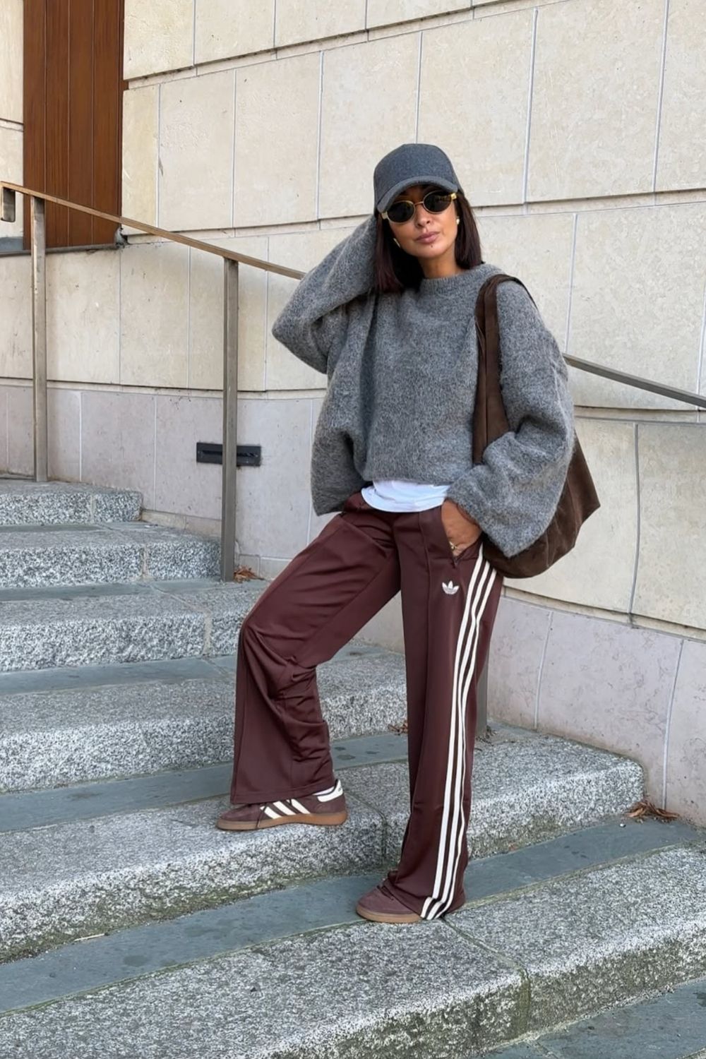 Discover chic Adidas track pants outfit ideas that blend sporty comfort with street-style flair. From cozy layers to elevated casual looks, learn how to style your favorite three-stripe pants for every season and occasion. Adidas Track Pants Outfit Woman, Adidas Track Pants Outfit Aesthetic, Adidas Track Jacket Outfit Street Style, Adidas Track Shorts Outfit, Black Adidas Track Pants Outfit, Blue Adidas Track Pants Outfit, Adidas Track Suit Outfit, Adidas Track Pants Outfit Winter, Adidas Track Pants Outfit Casual, Adidas Track Top Outfit