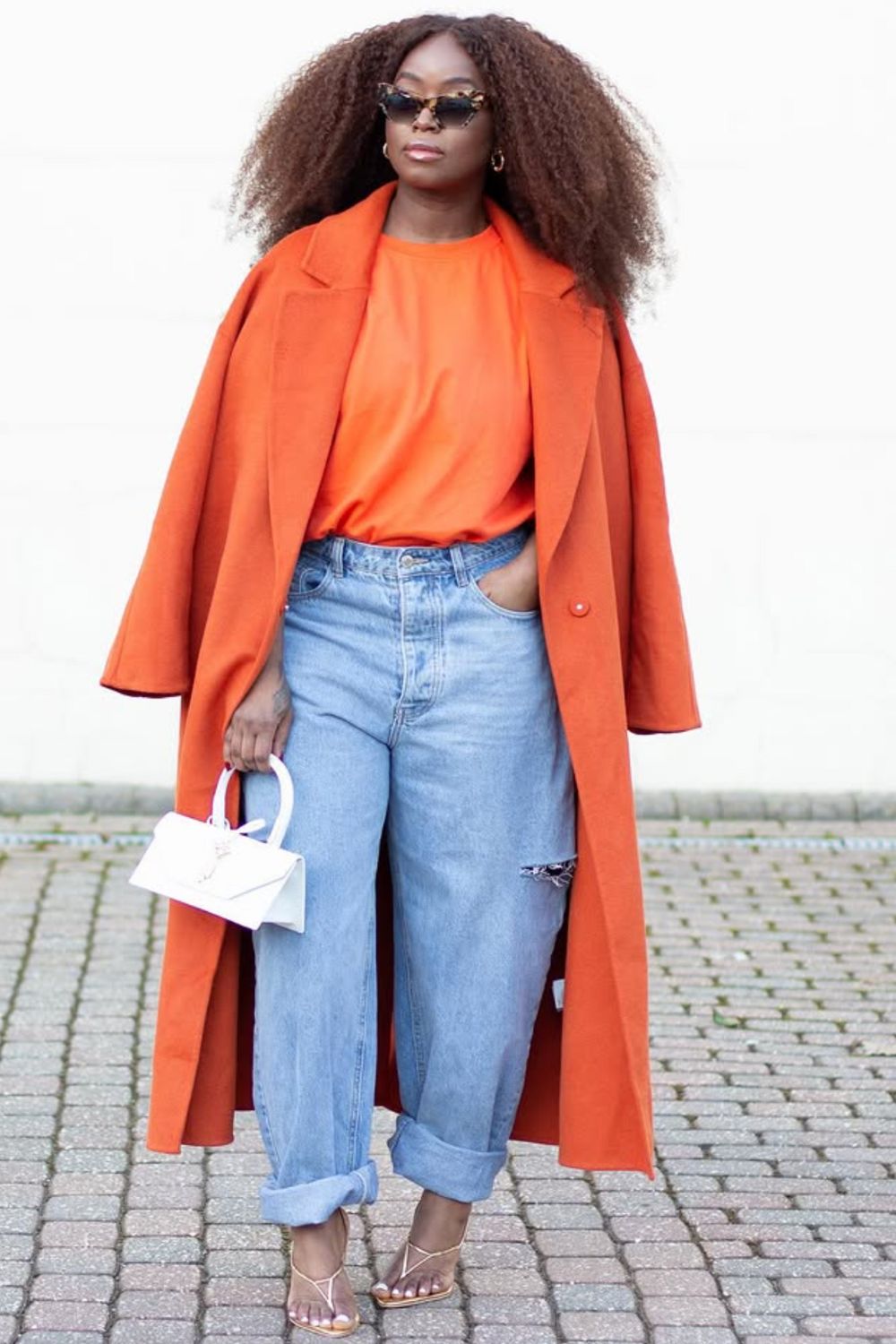 Discover 25+ chic orange coat outfit ideas, from bold color-blocking to effortless everyday looks. Get styling tips, layering inspiration, and fashion-forward ways to wear a statement orange coat for any season. Perfect for trend-loving readers. Orange Coat Outfit, Orange Coat Outfit Winter, Orange Trench Coat Outfit, Orange Fur Coat Outfit, Burnt Orange Trench Coat Outfit, Orange Long Coat Outfit, Orange Coat Outfit Autumn, Orange Wool Coat Outfit, Orange Teddy Coat Outfit, Orange Puffer Coat Outfit