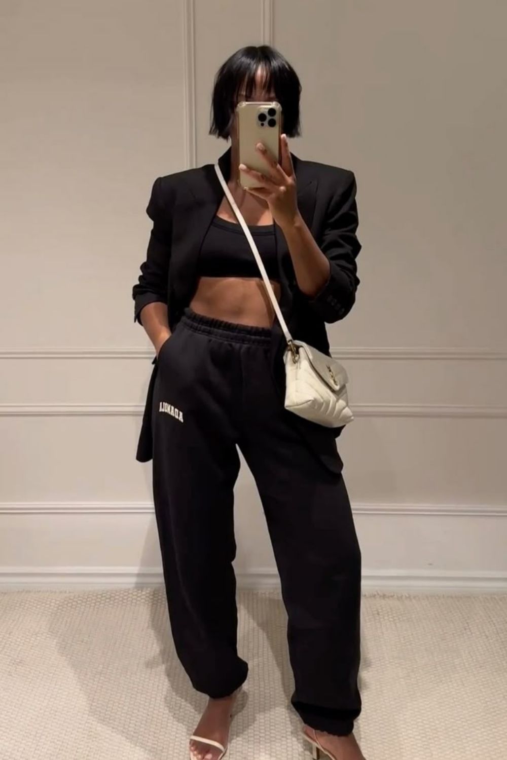 Effortless black sweatpants outfit ideas that look chic, polished, and modern. Discover how to style black sweatpants with jackets, coats, sneakers, heels, and accessories for everyday casual outfits that still feel fashion-forward. sweatpants outfit black women, black sweatpants outfit for school, black sweatpants outfit aesthetic, black baggy sweatpants outfit, black wide leg sweatpants outfit, black sweatpants outfit winter, outfit with black sweatpants, black cargo sweatpants outfit, outfit ideas black sweatpants, Baggy Sweatpants Outfit, Wide Leg Sweatpants Outfit, Cute Sweatpants Outfit, Cargo Sweatpants Outfit, Outfit Ideas Sweatpants, Nike Sweatpants Outfit, Sweatpants Outfit Black Women, Sweatpants Outfit Winter, Sweatpants Outfit Aesthetic, Flare Sweatpants Outfit Effortless black sweatpants outfit ideas that look chic, polished, and modern. Discover how to style black sweatpants with jackets, coats, sneakers, heels, and accessories for everyday casual outfits that still feel fashion-forward. sweatpants outfit black women, black sweatpants outfit for school, black sweatpants outfit aesthetic, black baggy sweatpants outfit, black wide leg sweatpants outfit, black sweatpants outfit winter, outfit with black sweatpants, black cargo sweatpants outfit, outfit ideas black sweatpants, Baggy Sweatpants Outfit, Wide Leg Sweatpants Outfit, Cute Sweatpants Outfit, Cargo Sweatpants Outfit, Outfit Ideas Sweatpants, Nike Sweatpants Outfit, Sweatpants Outfit Black Women, Sweatpants Outfit Winter, Sweatpants Outfit Aesthetic, Flare Sweatpants Outfit