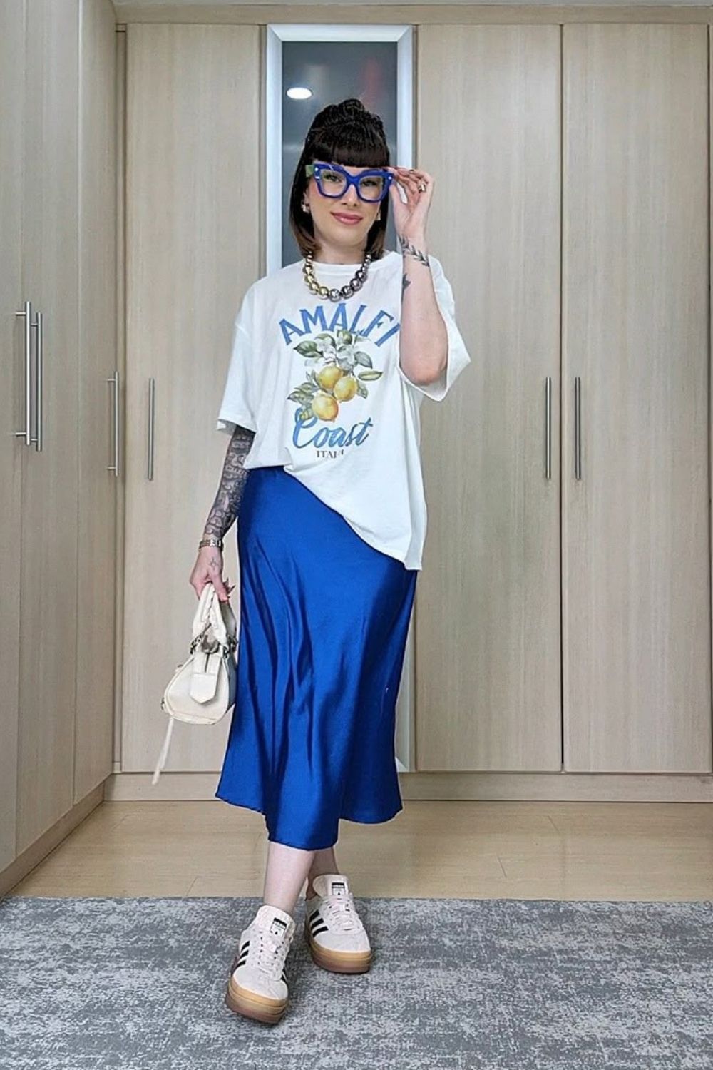 Discover chic blue satin skirt outfit ideas, styling tips, and elegant ways to wear a blue satin skirt for every occasion—from casual daytime looks to polished evening outfits. Navy Blue Satin Skirt Outfit, Dark Blue Satin Skirt Outfit, Satin Blue Skirt Outfit, Light Blue Satin Skirt Outfit, Blue Satin Skirt Outfit Winter, Blue Satin Skirt Outfit Summer, Blue Satin Midi Skirt Outfit, Long Satin Skirt Outfit, Satin Skirt Outfit Classy, Satin Skirt Outfit Winter, Satin Skirt Outfit Summer, Satin Maxi Skirt Outfit, Satin Skirt Outfit Casual, Satin Skirt Outfit Hijab, Satin Skirt Outfit Elegant, Satin Skirt Winter Outfit, Maxi Satin Skirt Outfit, Midi Satin Skirt Outfit, Satin Long Skirt Outfit Discover chic blue satin skirt outfit ideas, styling tips, and elegant ways to wear a blue satin skirt for every occasion—from casual daytime looks to polished evening outfits. Navy Blue Satin Skirt Outfit, Dark Blue Satin Skirt Outfit, Satin Blue Skirt Outfit, Light Blue Satin Skirt Outfit, Blue Satin Skirt Outfit Winter, Blue Satin Skirt Outfit Summer, Blue Satin Midi Skirt Outfit, Long Satin Skirt Outfit, Satin Skirt Outfit Classy, Satin Skirt Outfit Winter, Satin Skirt Outfit Summer, Satin Maxi Skirt Outfit, Satin Skirt Outfit Casual, Satin Skirt Outfit Hijab, Satin Skirt Outfit Elegant, Satin Skirt Winter Outfit, Maxi Satin Skirt Outfit, Midi Satin Skirt Outfit, Satin Long Skirt Outfit