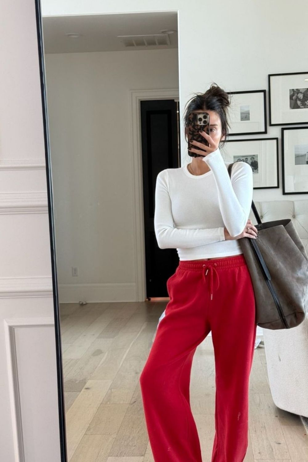 Outfit ideas you’ll actually want to wear. Discover how to style red sweatpants for casual days, street style moments, and elevated off-duty looks with ease. Red Sweatpants Outfit, Dark Red Sweatpants Outfit, Red Brandy Sweatpants Outfit, Red Nike Sweatpants Outfit, Baggy Sweatpants Outfit, Wide Leg Sweatpants Outfit, Cute Sweatpants Outfit, Sweatpants Outfit For School, Cargo Sweatpants Outfit, Outfit Ideas Sweatpants, Nike Sweatpants Outfit, Sweatpants Outfit Black Women, Sweatpants Outfit Winter, Sweatpants Outfit Aesthetic, Flare Sweatpants Outfit