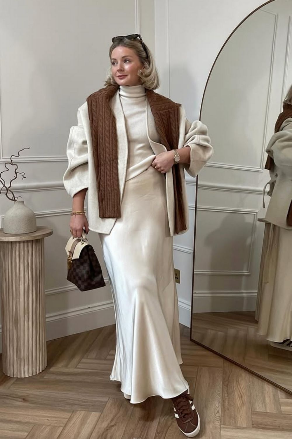 Discover chic white satin skirt outfit ideas for every season, from casual everyday looks to elegant evening styles. Learn how to style a white satin skirt with knits, blazers, sneakers, and heels for effortless, polished outfits. Satin White Skirt Outfit, White Satin Skirt Outfit Winter, White Satin Skirt Outfit Summer, Off White Satin Skirt Outfit, White Satin Maxi Skirt Outfit, White Satin Midi Skirt Outfit, Long White Satin Skirt Outfit, Short White Satin Skirt Outfit, Long Satin Skirt Outfit, Satin Skirt Outfit Classy, Satin Skirt Outfit Winter, Satin Skirt Outfit Summer, Satin Maxi Skirt Outfit, Satin Skirt Outfit Casual, Satin Skirt Outfit Hijab, Satin Skirt Outfit Elegant, Satin Skirt Winter Outfit, Maxi Satin Skirt Outfit, Midi Satin Skirt Outfit, Satin Long Skirt Outfit