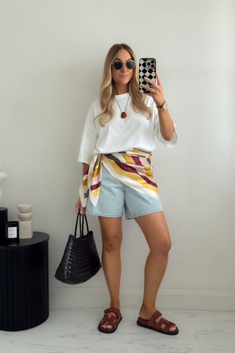 Discover chic and effortless blue denim shorts outfit ideas you can wear all summer long. From polished blazer looks to casual tees, coastal styles, and elevated basics, these outfits show you exactly how to style denim shorts for any occasion with modern, flattering pieces and accessories. Blue Denim Shorts Outfit, Blue Denim Shorts Outfit Summer, Blue Denim Shorts Outfits Women, Blue Denim Shorts Outfit Summer Casual, Blue Denim Shorts Outfit Ideas, Blue Denim Shorts Outfit Ideas, Blue Denim Shorts Fit, Blue Denim Shorts Outfit Aesthetic, Blue Denim Shorts Styling Ideas