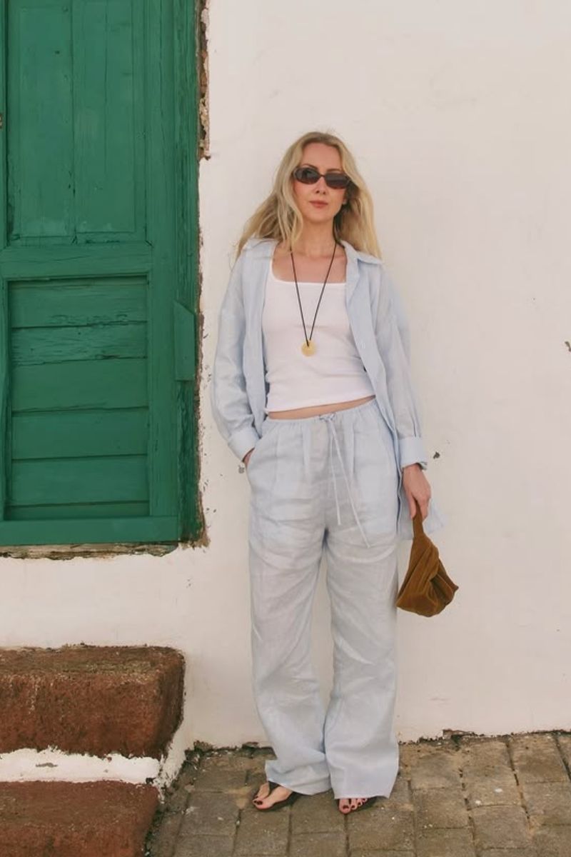 Discover effortlessly chic blue linen pants outfit ideas perfect for summer, from relaxed everyday looks to elevated, polished styles. Get inspired with stylish outfit combinations, expert styling tips, and must-have pieces to create versatile, breathable, and fashion-forward linen outfits for any occasion. Blue Linen Pants With Black Shirt, Blue Linen Pants With Sweater, Blue Linen Pants With White Shirt, Blue Linen Pants With Yellow Top, Blue Linen Pants With White Top, Blue Linen Pants With Hoodie, Blue Linen Pants With Stripes, Blue Linen Pants With Sneakers, Blue Linen Pants Outfit Summer, Blue Linen Pants Outfit Work, Blue Linen Pants Outfit Spring, Blue Linen Pants Outfit Black Women, Blue Linen Pants Outfit Winter, Blue Linen Pants Outfit Hijab, Blue Linen Pants Outfit Fall
