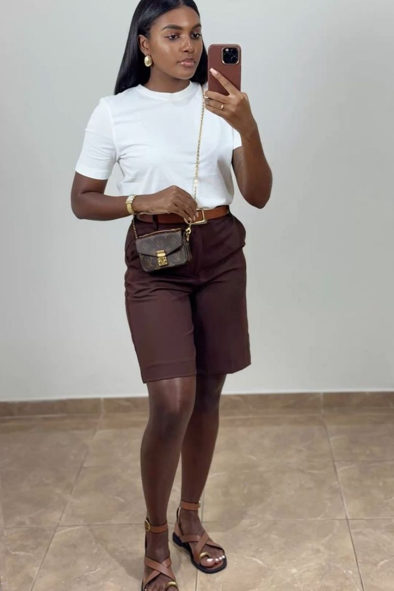 Looking for stylish ways to wear brown shorts? Discover chic brown shorts outfit ideas you can easily recreate, from tailored bermuda looks to casual everyday styling. Whether you’re dressing for brunch, travel, or summer days out, these outfit ideas will help you look effortlessly polished and put together.&nbsp;Brown Shorts With Boots, Brown Shorts With Black Top, Brown Shorts With Belt, Brown Shorts With White Top, Brown Shorts With Black Boots, Brown Shorts With Top, What To Wear With Chocolate Brown Shorts, What Color Shirt To Wear With Brown Shorts, What Shirt Goes With Brown Shorts, What Goes With Brown Shorts, What To Pair Brown Shorts With, Brown Shorts Outfit Summer, Brown Shorts Outfits Women Summer, Brown Shorts Outfit Casual, Club Outfit, Brown Shorts Outfit Ideas