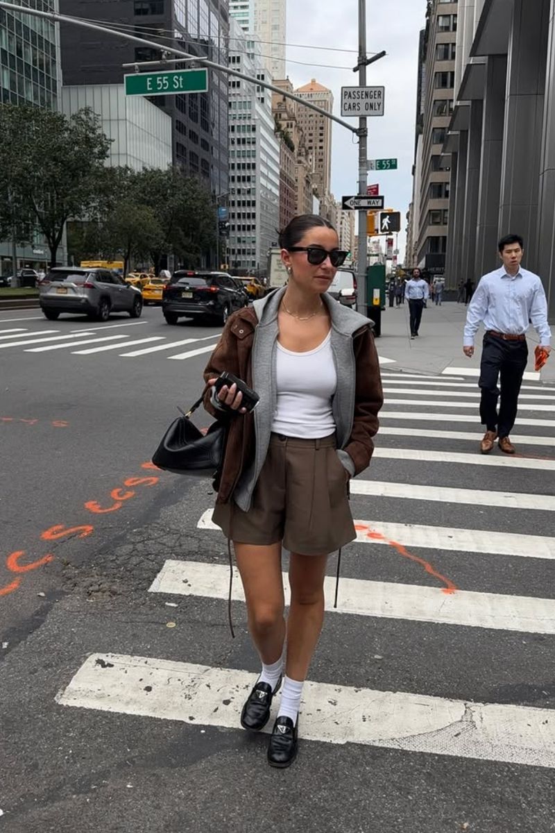 Looking for stylish ways to wear brown shorts? Discover chic brown shorts outfit ideas you can easily recreate, from tailored bermuda looks to casual everyday styling. Whether you’re dressing for brunch, travel, or summer days out, these outfit ideas will help you look effortlessly polished and put together.&nbsp;Brown Shorts With Boots, Brown Shorts With Black Top, Brown Shorts With Belt, Brown Shorts With White Top, Brown Shorts With Black Boots, Brown Shorts With Top, What To Wear With Chocolate Brown Shorts, What Color Shirt To Wear With Brown Shorts, What Shirt Goes With Brown Shorts, What Goes With Brown Shorts, What To Pair Brown Shorts With, Brown Shorts Outfit Summer, Brown Shorts Outfits Women Summer, Brown Shorts Outfit Casual, Club Outfit, Brown Shorts Outfit Ideas