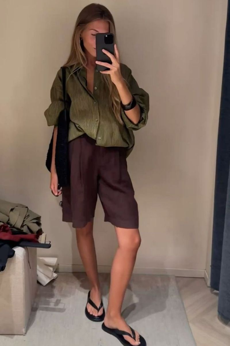 Looking for stylish ways to wear brown shorts? Discover chic brown shorts outfit ideas you can easily recreate, from tailored bermuda looks to casual everyday styling. Whether you’re dressing for brunch, travel, or summer days out, these outfit ideas will help you look effortlessly polished and put together.&nbsp;Brown Shorts With Boots, Brown Shorts With Black Top, Brown Shorts With Belt, Brown Shorts With White Top, Brown Shorts With Black Boots, Brown Shorts With Top, What To Wear With Chocolate Brown Shorts, What Color Shirt To Wear With Brown Shorts, What Shirt Goes With Brown Shorts, What Goes With Brown Shorts, What To Pair Brown Shorts With, Brown Shorts Outfit Summer, Brown Shorts Outfits Women Summer, Brown Shorts Outfit Casual, Club Outfit, Brown Shorts Outfit Ideas