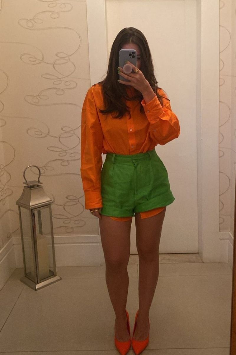 Discover chic and effortless green shorts outfit ideas you’ll want to wear all season long. From tailored looks to casual street style, this guide shows you exactly how to style green shorts with confidence using color pairing tips, accessories, and elevated outfit inspiration for any occasion. What To Where With Green Shorts, What To Wear Green Shorts, What To Wear With Green And White Shorts, What To Wear With Green Shorts Outfits, What Goes With Green Shorts, What To Wear With Light Green Shorts, What Goes With Olive Green Shorts, Green Shorts With Pink Stripes Outfit, Green Shorts With White Top, Green Shorts With Boots, Green Shorts With Pink Top, Green Shorts Outfits Women, Green Shorts Outfit Ideas, Green Shorts Outfit Aesthetic, Green Shorts Fit