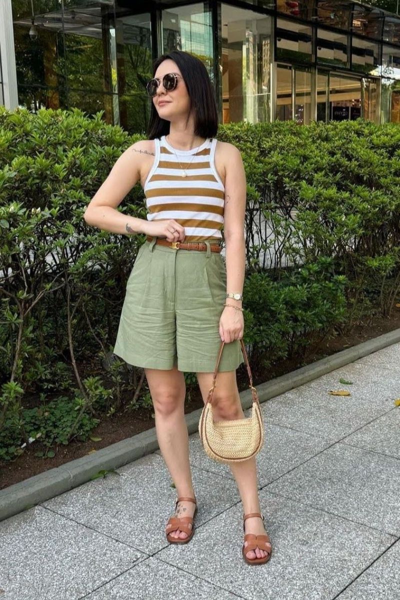 Discover chic and effortless green shorts outfit ideas you’ll want to wear all season long. From tailored looks to casual street style, this guide shows you exactly how to style green shorts with confidence using color pairing tips, accessories, and elevated outfit inspiration for any occasion. What To Where With Green Shorts, What To Wear Green Shorts, What To Wear With Green And White Shorts, What To Wear With Green Shorts Outfits, What Goes With Green Shorts, What To Wear With Light Green Shorts, What Goes With Olive Green Shorts, Green Shorts With Pink Stripes Outfit, Green Shorts With White Top, Green Shorts With Boots, Green Shorts With Pink Top, Green Shorts Outfits Women, Green Shorts Outfit Ideas, Green Shorts Outfit Aesthetic, Green Shorts Fit