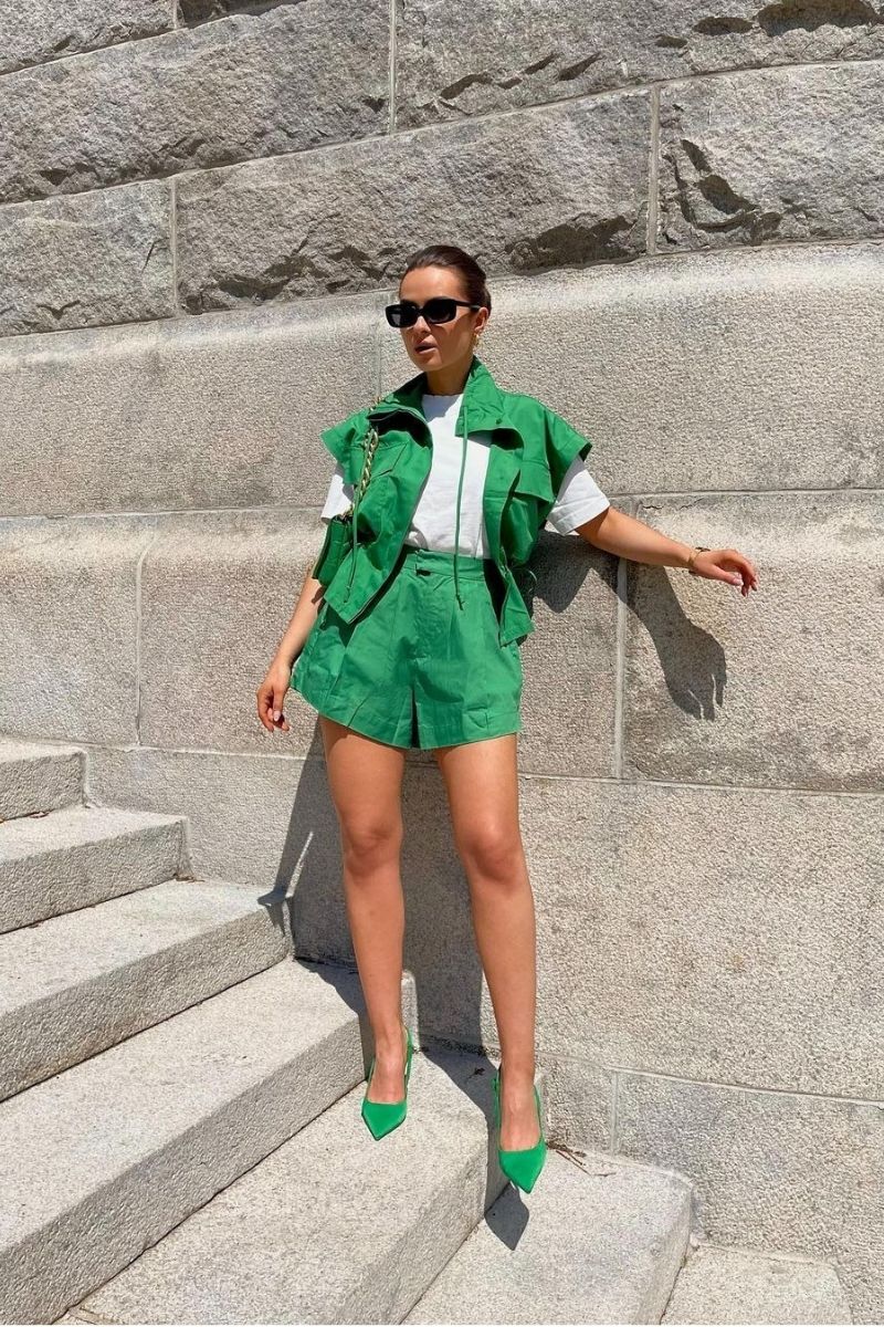Discover chic and effortless green shorts outfit ideas you’ll want to wear all season long. From tailored looks to casual street style, this guide shows you exactly how to style green shorts with confidence using color pairing tips, accessories, and elevated outfit inspiration for any occasion. What To Where With Green Shorts, What To Wear Green Shorts, What To Wear With Green And White Shorts, What To Wear With Green Shorts Outfits, What Goes With Green Shorts, What To Wear With Light Green Shorts, What Goes With Olive Green Shorts, Green Shorts With Pink Stripes Outfit, Green Shorts With White Top, Green Shorts With Boots, Green Shorts With Pink Top, Green Shorts Outfits Women, Green Shorts Outfit Ideas, Green Shorts Outfit Aesthetic, Green Shorts Fit