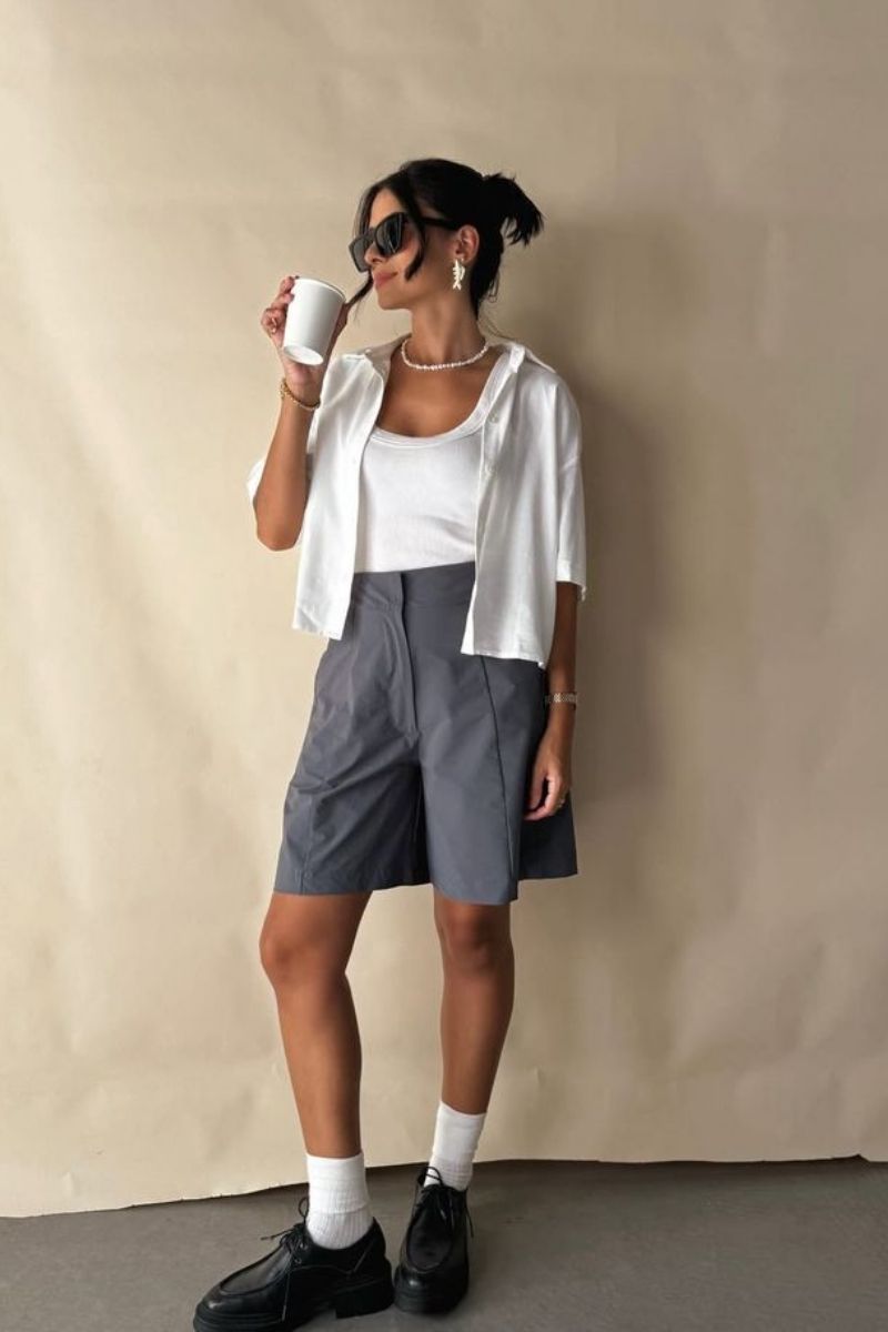 Discover chic and effortless grey shorts outfit ideas you can wear anywhere, from casual days to elevated evenings. From tailored looks to relaxed styling, explore how to style grey shorts with modern pieces, must-have accessories, and on-trend combinations that instantly elevate your wardrobe. Grey Shorts Outfit Women, Grey Shorts Outfit Summer, Grey Shorts Outfit Ideas, Grey Shorts Outfit Women Casual Summer, Grey Shorts Outfit Casual, Grey Shorts Styling, Grey Shorts With Tights, Grey Shorts With Black Shirt, Grey Shorts With Hoodie, Grey Shorts With Boots, Grey Shorts With White Top, Grey Shorts With Timbs, Grey Shorts With Black Top, Grey Shorts With White Shirt, Grey Shorts With Pink Top, What Should I Wear With Grey Shorts, What To Wear With Grey Baggy Shorts