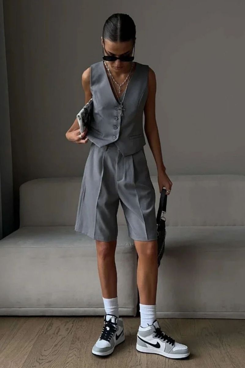 Discover chic and effortless grey shorts outfit ideas you can wear anywhere, from casual days to elevated evenings. From tailored looks to relaxed styling, explore how to style grey shorts with modern pieces, must-have accessories, and on-trend combinations that instantly elevate your wardrobe. Grey Shorts Outfit Women, Grey Shorts Outfit Summer, Grey Shorts Outfit Ideas, Grey Shorts Outfit Women Casual Summer, Grey Shorts Outfit Casual, Grey Shorts Styling, Grey Shorts With Tights, Grey Shorts With Black Shirt, Grey Shorts With Hoodie, Grey Shorts With Boots, Grey Shorts With White Top, Grey Shorts With Timbs, Grey Shorts With Black Top, Grey Shorts With White Shirt, Grey Shorts With Pink Top, What Should I Wear With Grey Shorts, What To Wear With Grey Baggy Shorts