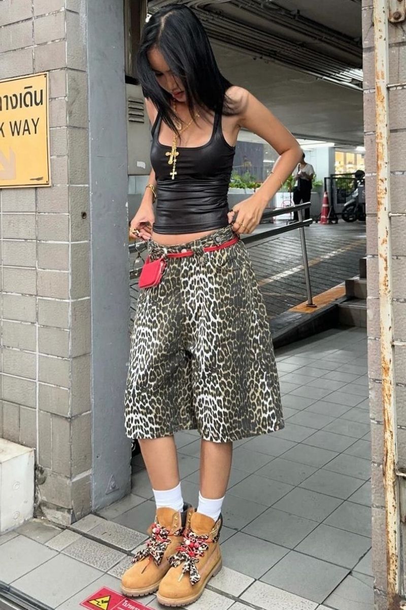Discover chic and effortless ways to style leopard shorts with these fashion-forward outfit ideas. From casual streetwear to elevated looks, explore versatile styling tips, trendy pairings, and must-have accessories to create bold, wearable outfits for any occasion. Leopard Shorts Outfit, Leopard Shorts Outfit Summer, Leopard Shorts Outfit Winter, Leopard Shorts Outfit Winter, Leopard Shorts Rave Outfit, Leopard Shorts Rave Outfit, Leopard Shorts Outfit Festival, Leopard Shorts With Black Top, Leopard Shorts With Sambas, What Goes With Leopard Print Shorts, What To Wear With Leopard Print Shorts, What To Wear With Leopard Shorts, Leopard Print Shorts Outfit, Leopard Print Shorts Outfit Black Women, Leopard Print Shorts Outfit Ideas, Leopard Print Shorts Festival
