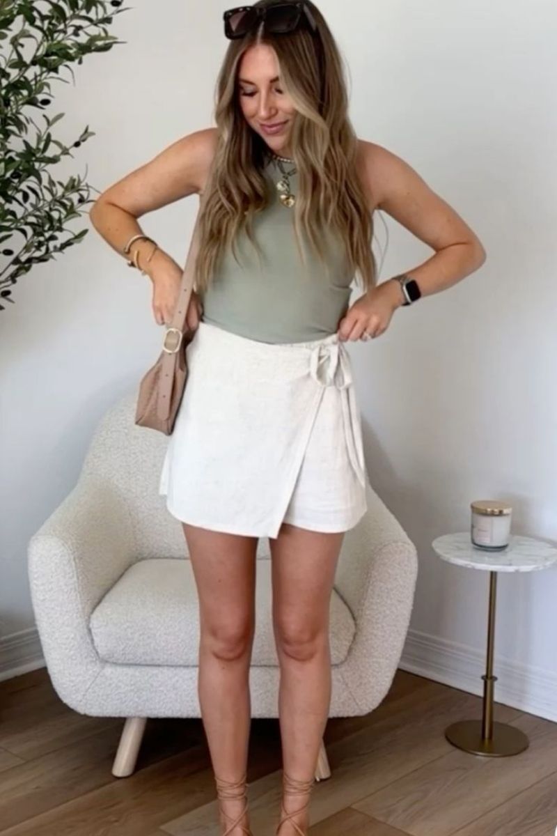 Discover the best linen mini skirt outfit ideas for summer, from chic neutral co-ords to casual oversized shirt looks and elevated vacation outfits. I’m sharing stylish ways to wear linen mini skirts with sandals, sneakers, tanks, vests, and effortless accessories for an easy yet polished warm-weather wardrobe. Linen Mini Skirt Outfit, Linen Mini Skirt Outfit Summer, Linen Mini Skirt Outfit Ideas, Linen Mini Skirt Set, Linen Mini Skirt Outfit Black, Linen Mini Skirt Outfit Black, Linen Mini Skirt And Top Set, Black, White, Sweater, Linen Mini Skirt With Boots, With Belt, What To Wear With A White Linen Mini Skirt, Short Linen Skirt Outfit Summer, Short Linen Skirt Styling, Short Linen Skirt Outfit Fall, Short Linen Skirt Outfit Casual, Plus Size, Short Linen Skirt Fits