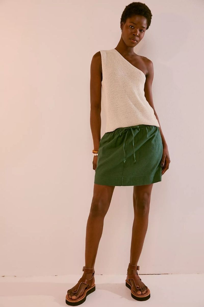 Discover the best linen mini skirt outfit ideas for summer, from chic neutral co-ords to casual oversized shirt looks and elevated vacation outfits. I’m sharing stylish ways to wear linen mini skirts with sandals, sneakers, tanks, vests, and effortless accessories for an easy yet polished warm-weather wardrobe. Linen Mini Skirt Outfit, Linen Mini Skirt Outfit Summer, Linen Mini Skirt Outfit Ideas, Linen Mini Skirt Set, Linen Mini Skirt Outfit Black, Linen Mini Skirt Outfit Black, Linen Mini Skirt And Top Set, Black, White, Sweater, Linen Mini Skirt With Boots, With Belt, What To Wear With A White Linen Mini Skirt, Short Linen Skirt Outfit Summer, Short Linen Skirt Styling, Short Linen Skirt Outfit Fall, Short Linen Skirt Outfit Casual, Plus Size, Short Linen Skirt Fits