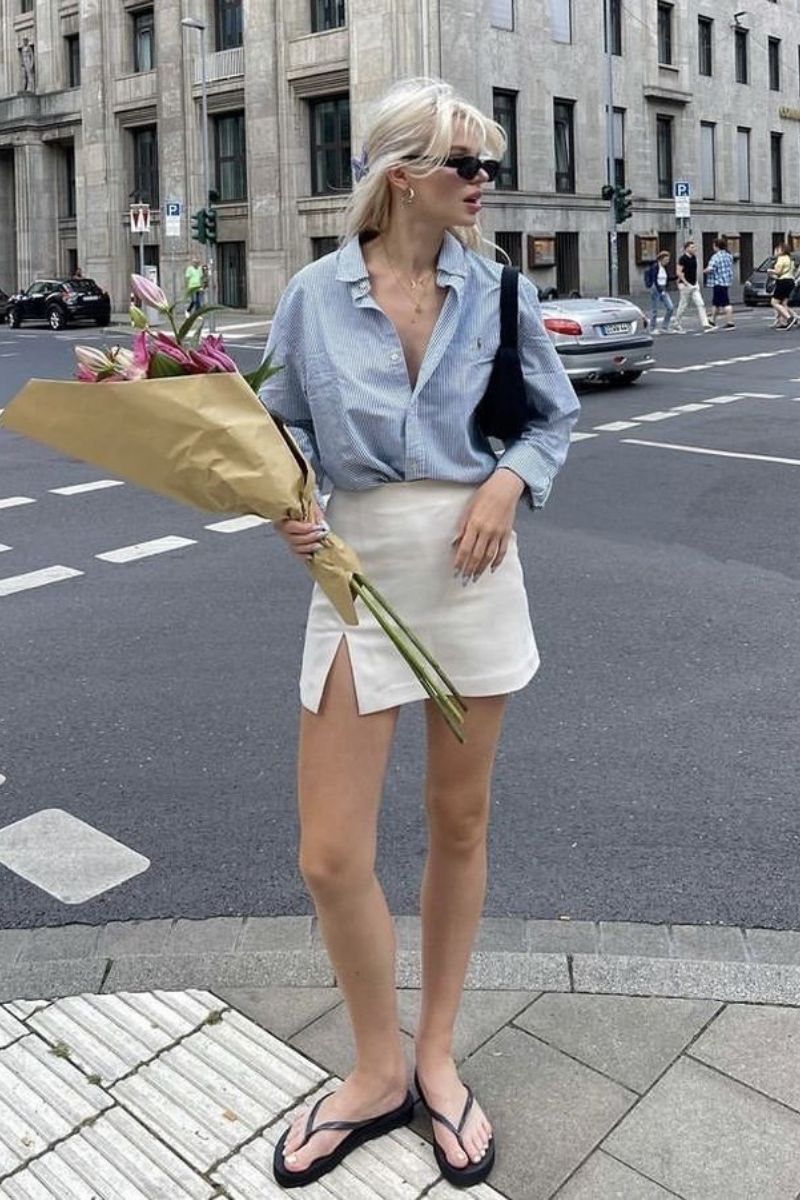 Discover the best linen mini skirt outfit ideas for summer, from chic neutral co-ords to casual oversized shirt looks and elevated vacation outfits. I’m sharing stylish ways to wear linen mini skirts with sandals, sneakers, tanks, vests, and effortless accessories for an easy yet polished warm-weather wardrobe. Linen Mini Skirt Outfit, Linen Mini Skirt Outfit Summer, Linen Mini Skirt Outfit Ideas, Linen Mini Skirt Set, Linen Mini Skirt Outfit Black, Linen Mini Skirt Outfit Black, Linen Mini Skirt And Top Set, Black, White, Sweater, Linen Mini Skirt With Boots, With Belt, What To Wear With A White Linen Mini Skirt, Short Linen Skirt Outfit Summer, Short Linen Skirt Styling, Short Linen Skirt Outfit Fall, Short Linen Skirt Outfit Casual, Plus Size, Short Linen Skirt Fits