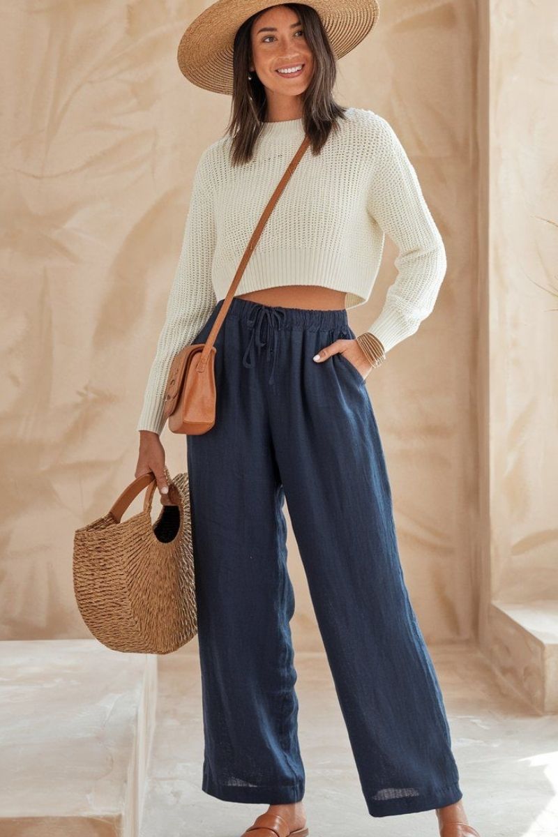 Discover chic and effortless ways to style navy linen pants with these outfit ideas perfect for summer and beyond. From casual everyday looks to elevated smart-casual outfits, this guide covers versatile styling tips, must-have pieces, and easy combinations to help you look polished, comfortable, and on-trend. Navy Linen Pants Outfit, Navy Linen Pants Outfit Summer, Navy Linen Pants Outfit Work, Winter, Navy Linen Pants Outfit Spring, Summer Casual, Fall, Navy Linen Pants Fit, Hijab, Navy Linen Pants With Sweater, Navy Linen Pants With Sneakers, Navy Linen Pants With White Top, What Goes With Navy Blue Linen Pants, Outfits With Linen Navy Pants, Navy Linen Pants Outfit With Jacket, Navy Linen Pants With Cardigan, Shoes To Wear With Navy Linen Pants, Navy Linen Pants Styling