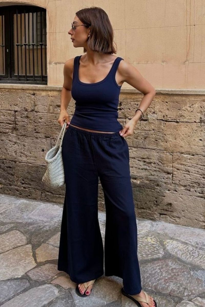 Discover chic and effortless ways to style navy linen pants with these outfit ideas perfect for summer and beyond. From casual everyday looks to elevated smart-casual outfits, this guide covers versatile styling tips, must-have pieces, and easy combinations to help you look polished, comfortable, and on-trend. Navy Linen Pants Outfit, Navy Linen Pants Outfit Summer, Navy Linen Pants Outfit Work, Winter, Navy Linen Pants Outfit Spring, Summer Casual, Fall, Navy Linen Pants Fit, Hijab, Navy Linen Pants With Sweater, Navy Linen Pants With Sneakers, Navy Linen Pants With White Top, What Goes With Navy Blue Linen Pants, Outfits With Linen Navy Pants, Navy Linen Pants Outfit With Jacket, Navy Linen Pants With Cardigan, Shoes To Wear With Navy Linen Pants, Navy Linen Pants Styling