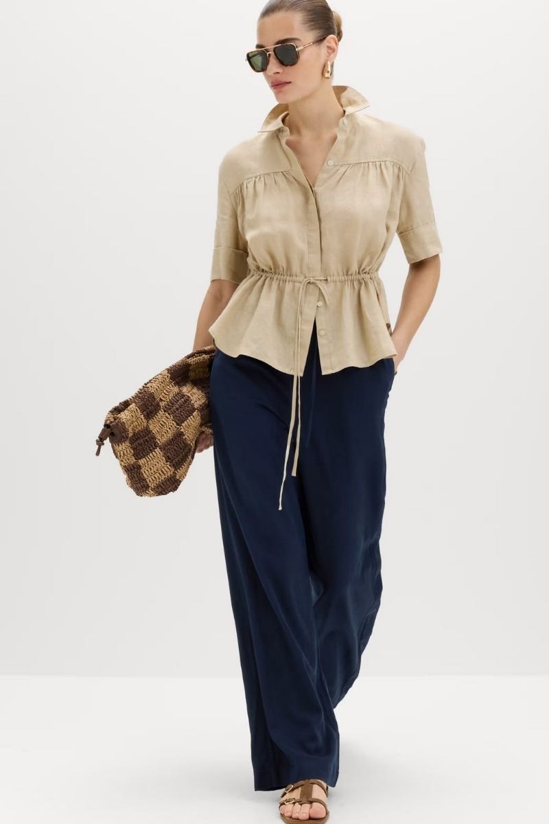 Discover chic and effortless ways to style navy linen pants with these outfit ideas perfect for summer and beyond. From casual everyday looks to elevated smart-casual outfits, this guide covers versatile styling tips, must-have pieces, and easy combinations to help you look polished, comfortable, and on-trend. Navy Linen Pants Outfit, Navy Linen Pants Outfit Summer, Navy Linen Pants Outfit Work, Winter, Navy Linen Pants Outfit Spring, Summer Casual, Fall, Navy Linen Pants Fit, Hijab, Navy Linen Pants With Sweater, Navy Linen Pants With Sneakers, Navy Linen Pants With White Top, What Goes With Navy Blue Linen Pants, Outfits With Linen Navy Pants, Navy Linen Pants Outfit With Jacket, Navy Linen Pants With Cardigan, Shoes To Wear With Navy Linen Pants, Navy Linen Pants Styling