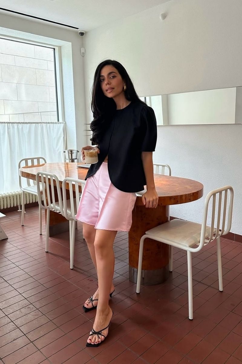 Discover chic and effortless pink shorts outfit ideas you’ll want to wear all summer long. From tailored Bermuda styles to bold hot pink looks, this guide covers how to style pink shorts with elevated basics, statement pieces, and on-trend accessories for every occasion. Pink Shorts Outfit Women, Pink Shorts Outfits Summer, Pink Shorts Outfit Ideas, Pink Shorts Outfits Summer Casual, Pink Shorts Outfits Casual, Pink Shorts Outfits Summer Street Styles, Pink Shorts Outfits Beach, Cute Outfit Ideas With Pink Shorts, Outfit Ideas With Light Pink Shorts, What To Wear With Pink And White Striped Shorts, What Tops To Wear With Pink Shorts, What Goes With Pink Shorts
