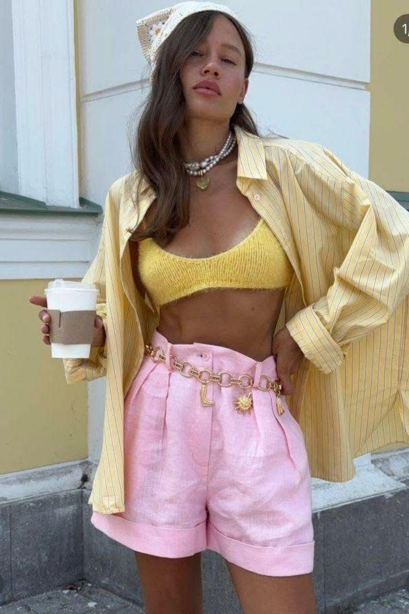 Discover chic and effortless pink shorts outfit ideas you’ll want to wear all summer long. From tailored Bermuda styles to bold hot pink looks, this guide covers how to style pink shorts with elevated basics, statement pieces, and on-trend accessories for every occasion. Pink Shorts Outfit Women, Pink Shorts Outfits Summer, Pink Shorts Outfit Ideas, Pink Shorts Outfits Summer Casual, Pink Shorts Outfits Casual, Pink Shorts Outfits Summer Street Styles, Pink Shorts Outfits Beach, Cute Outfit Ideas With Pink Shorts, Outfit Ideas With Light Pink Shorts, What To Wear With Pink And White Striped Shorts, What Tops To Wear With Pink Shorts, What Goes With Pink Shorts