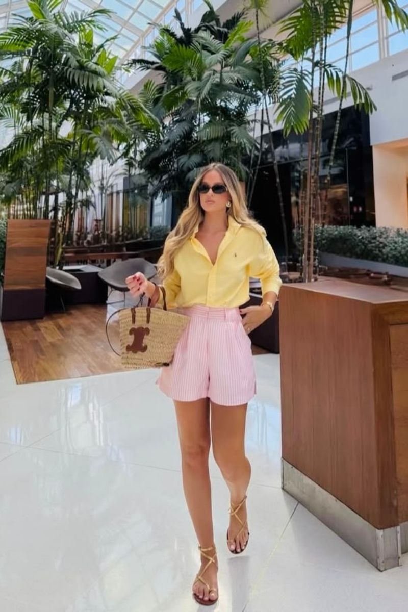 Discover chic and effortless pink shorts outfit ideas you’ll want to wear all summer long. From tailored Bermuda styles to bold hot pink looks, this guide covers how to style pink shorts with elevated basics, statement pieces, and on-trend accessories for every occasion. Pink Shorts Outfit Women, Pink Shorts Outfits Summer, Pink Shorts Outfit Ideas, Pink Shorts Outfits Summer Casual, Pink Shorts Outfits Casual, Pink Shorts Outfits Summer Street Styles, Pink Shorts Outfits Beach, Cute Outfit Ideas With Pink Shorts, Outfit Ideas With Light Pink Shorts, What To Wear With Pink And White Striped Shorts, What Tops To Wear With Pink Shorts, What Goes With Pink Shorts