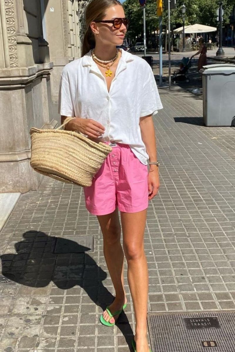 Discover chic and effortless pink shorts outfit ideas you’ll want to wear all summer long. From tailored Bermuda styles to bold hot pink looks, this guide covers how to style pink shorts with elevated basics, statement pieces, and on-trend accessories for every occasion. Pink Shorts Outfit Women, Pink Shorts Outfits Summer, Pink Shorts Outfit Ideas, Pink Shorts Outfits Summer Casual, Pink Shorts Outfits Casual, Pink Shorts Outfits Summer Street Styles, Pink Shorts Outfits Beach, Cute Outfit Ideas With Pink Shorts, Outfit Ideas With Light Pink Shorts, What To Wear With Pink And White Striped Shorts, What Tops To Wear With Pink Shorts, What Goes With Pink Shorts