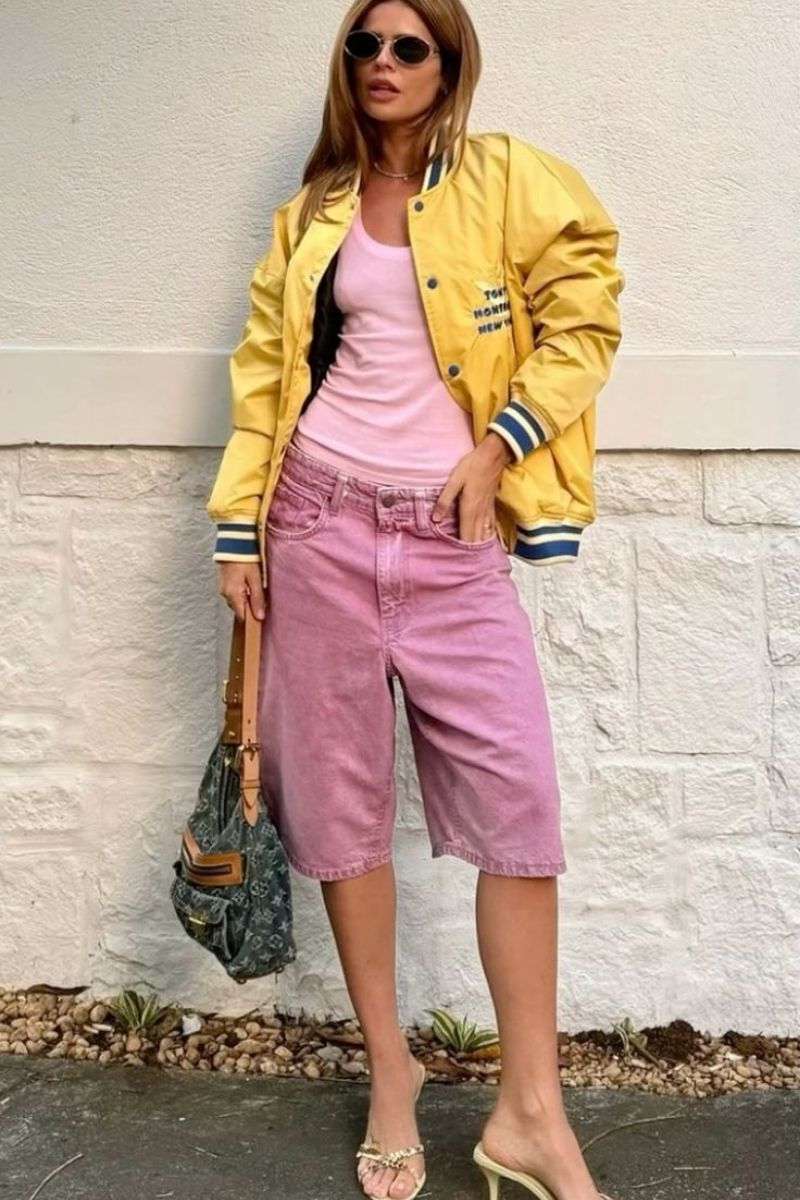 Discover chic and effortless pink shorts outfit ideas you’ll want to wear all summer long. From tailored Bermuda styles to bold hot pink looks, this guide covers how to style pink shorts with elevated basics, statement pieces, and on-trend accessories for every occasion. Pink Shorts Outfit Women, Pink Shorts Outfits Summer, Pink Shorts Outfit Ideas, Pink Shorts Outfits Summer Casual, Pink Shorts Outfits Casual, Pink Shorts Outfits Summer Street Styles, Pink Shorts Outfits Beach, Cute Outfit Ideas With Pink Shorts, Outfit Ideas With Light Pink Shorts, What To Wear With Pink And White Striped Shorts, What Tops To Wear With Pink Shorts, What Goes With Pink Shorts